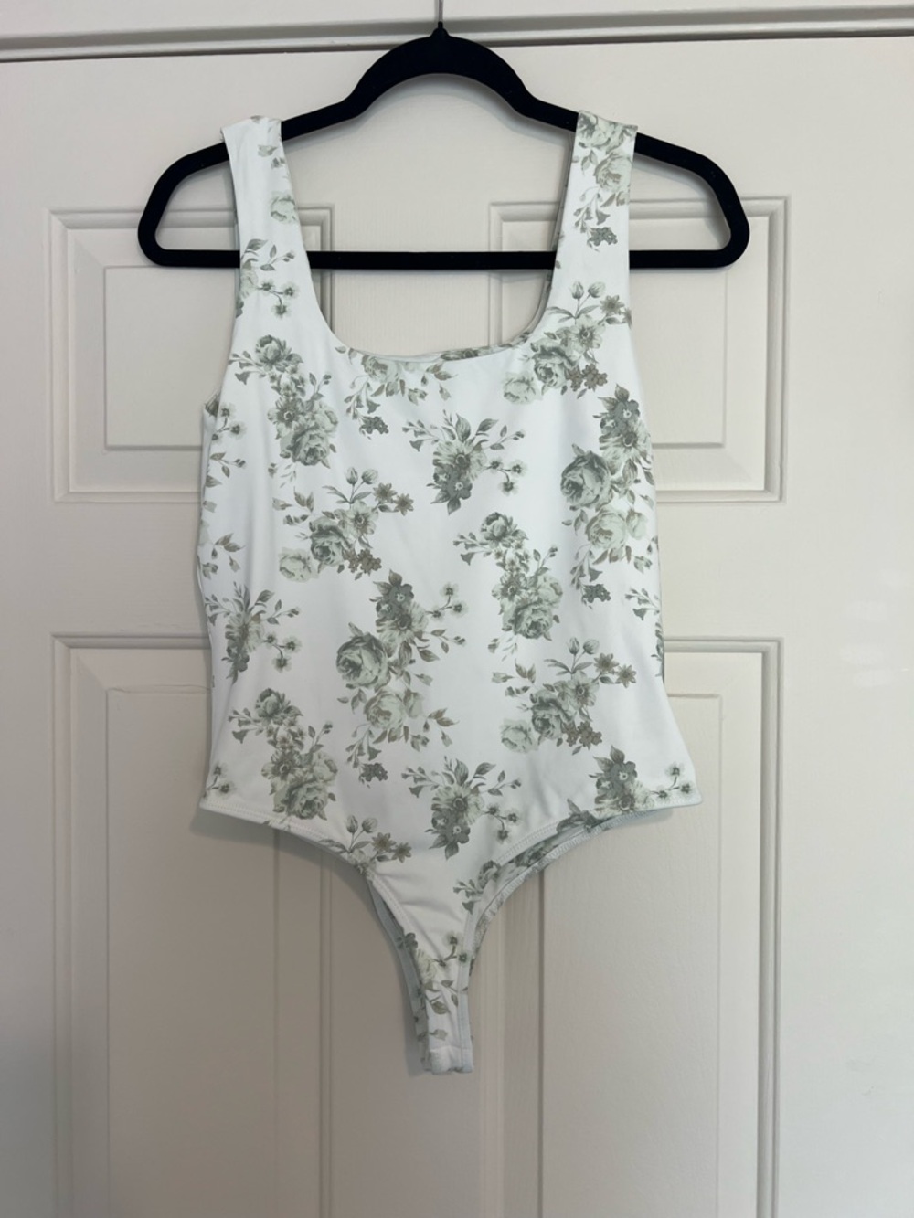 Francesca's Yummi White Bodysuit with Sage Floral Print